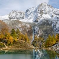 Icy mountain lake in the Val d'Hérens. Eurotrek-Alpin. Hiking vacations with Eurotrek.