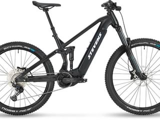 Black Stevens E-Inception 6 full-suspension e-mountain bike with front suspension fork, disc brakes, and Schwalbe tires on white background.