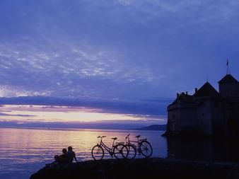 Evening atmosphere at Chillon Castle on Lake Geneva. Rhone route. Cycling holidays with Eurotrek.