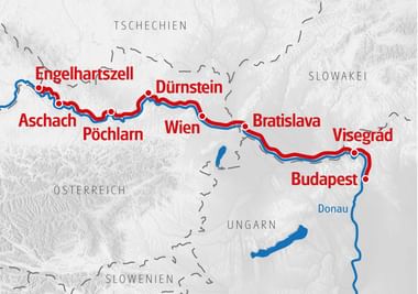 Map showing Danube cycling route from Engelhartszell to Budapest via Vienna, Bratislava and Visegrád. Red line marks the route along the blue Danube River.