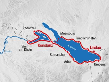 Karte mit Radroute um den Bodensee mit roter Linie, die Lindau, Bregenz, Arbon, Romanshorn, Konstanz, Radolfzell und Stein am Rhein verbindet.