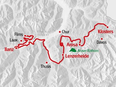 Topographic map showing gravel cycling routes in Graubünden, Switzerland. Red lines connect towns Ilanz, Flims, Laax, Chur, Arosa, Lenzerheide, and Klosters.