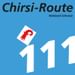 Blaues Routenschild mit 'Chirsi-Route', Nummer 111 und rotem Kirsch-Logo. Text 'Veloland Schweiz' kennzeichnet eine Schweizer Radroute.